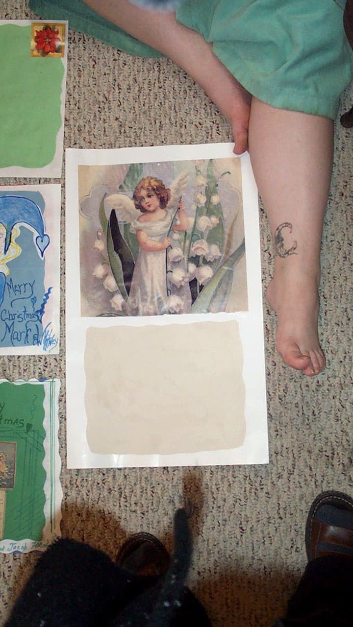 Amy and her feet with a greeting card