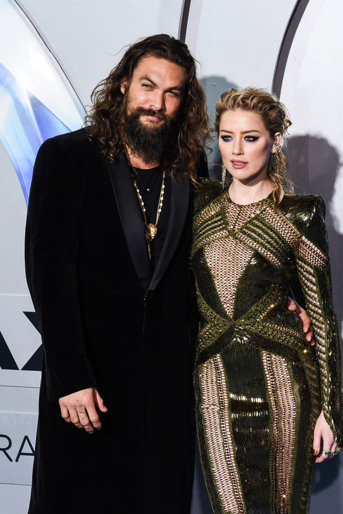 Actor Jason Momoa and actress Amber Heard arrive for the Premiere Of Warner Bros. Pictures' DCU film Aquaman