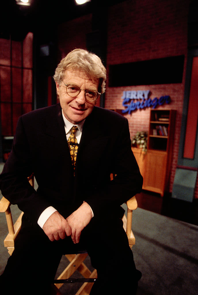 Talk show host Jerry Springer sits on the set of his TV program The Jerry Springer Show.
