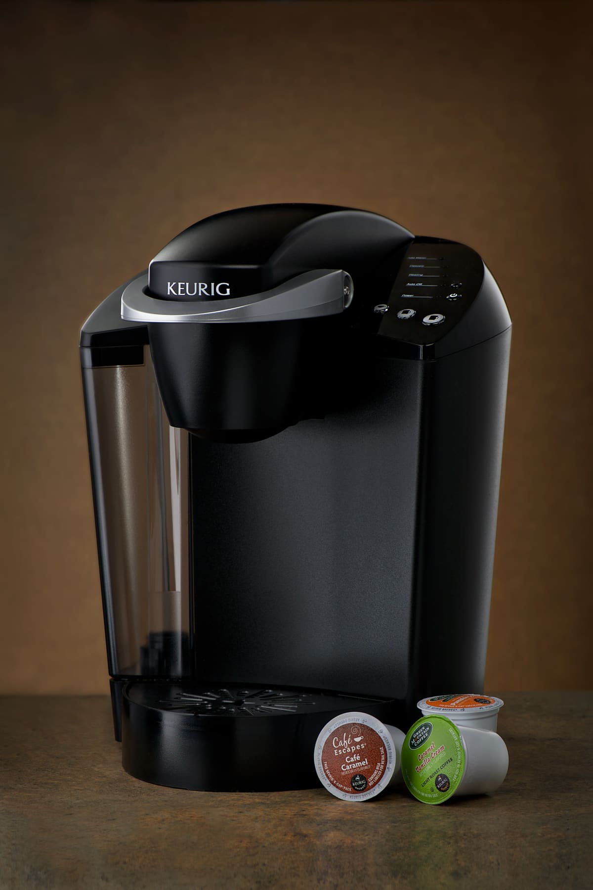 Monument, Colorado, USA - December 26, 2014: Keurig k-cup coffee maker with three k-cup pods. Keurig is popular