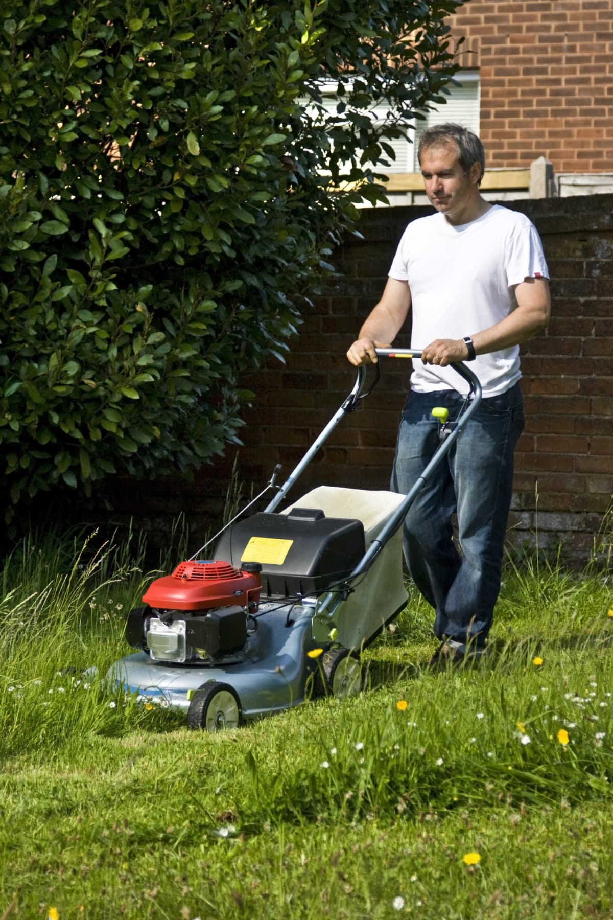 Man mowing a lawn