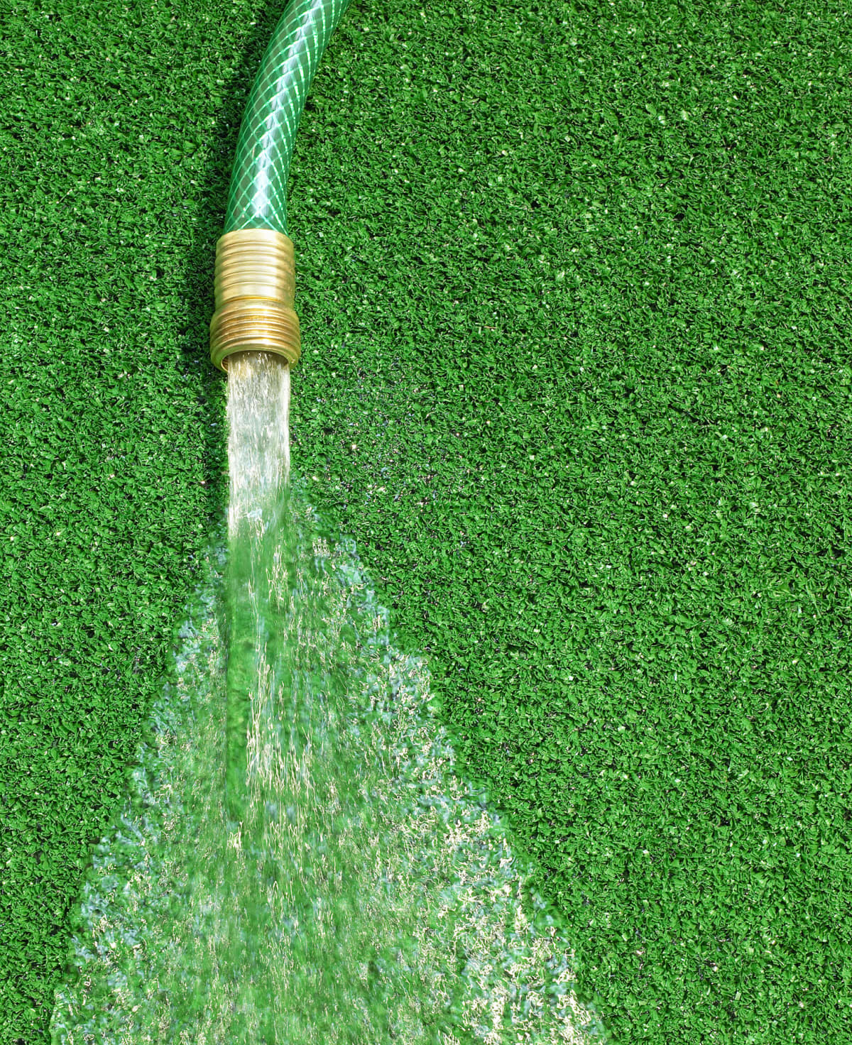 A hose on artificial grass