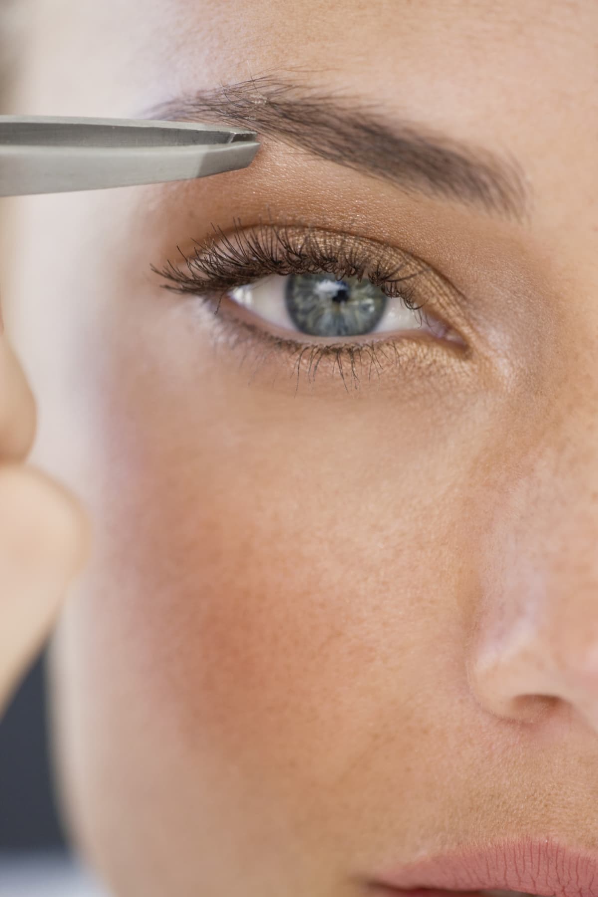 Close-up of woman's eye and eyelashes.