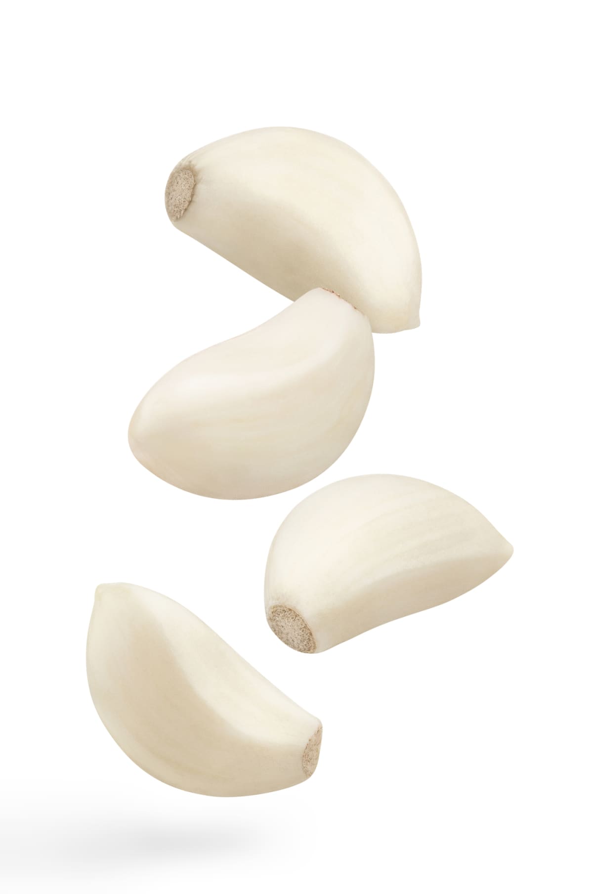 Garlic cloves in white background