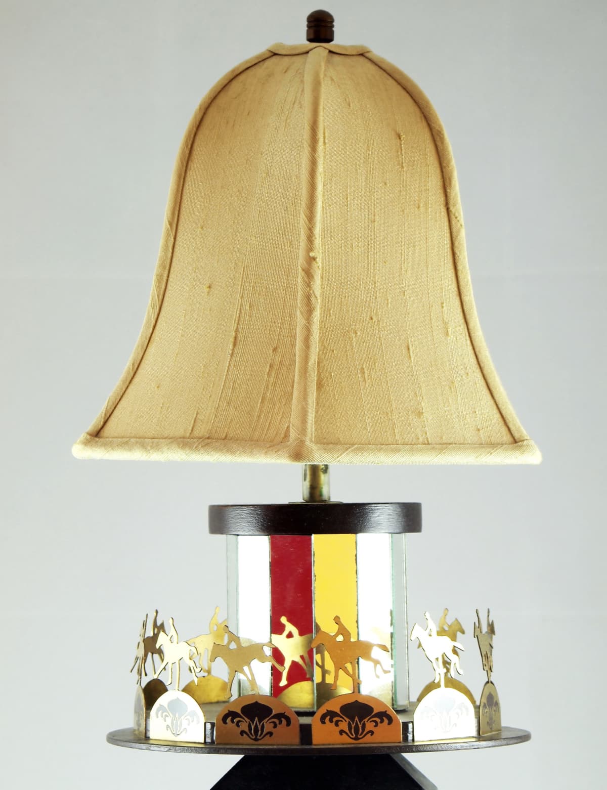 A lamp with a large shade on a table