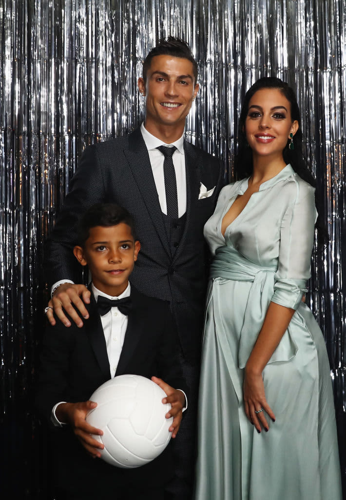 LONDON, ENGLAND - OCTOBER 23:  Cristiano Ronaldo, his girlfriend, Georgina Rodríguez and his son Cristiano Ronaldo Jr are pictured inside the photo booth prior to The Best FIFA Football Awards at The London Palladium on October 23, 2017 in London, England.  (Photo by Alexander Hassenstein - FIFA/FIFA via Getty Images)