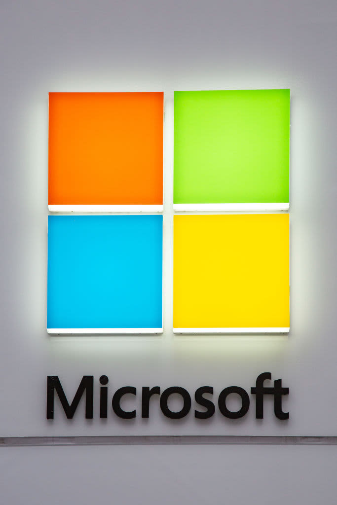 A Microsoft store entrance with the company's logo on top in midtown Manhattan at the 5th avenue in New York City, US, on 11 November 2019. Microsoft Corporation is world's largest software maker dominant in PC operating system Microsoft Windows, office applications, web browser and communication market. (Photo by Nicolas Economou/NurPhoto via Getty Images)