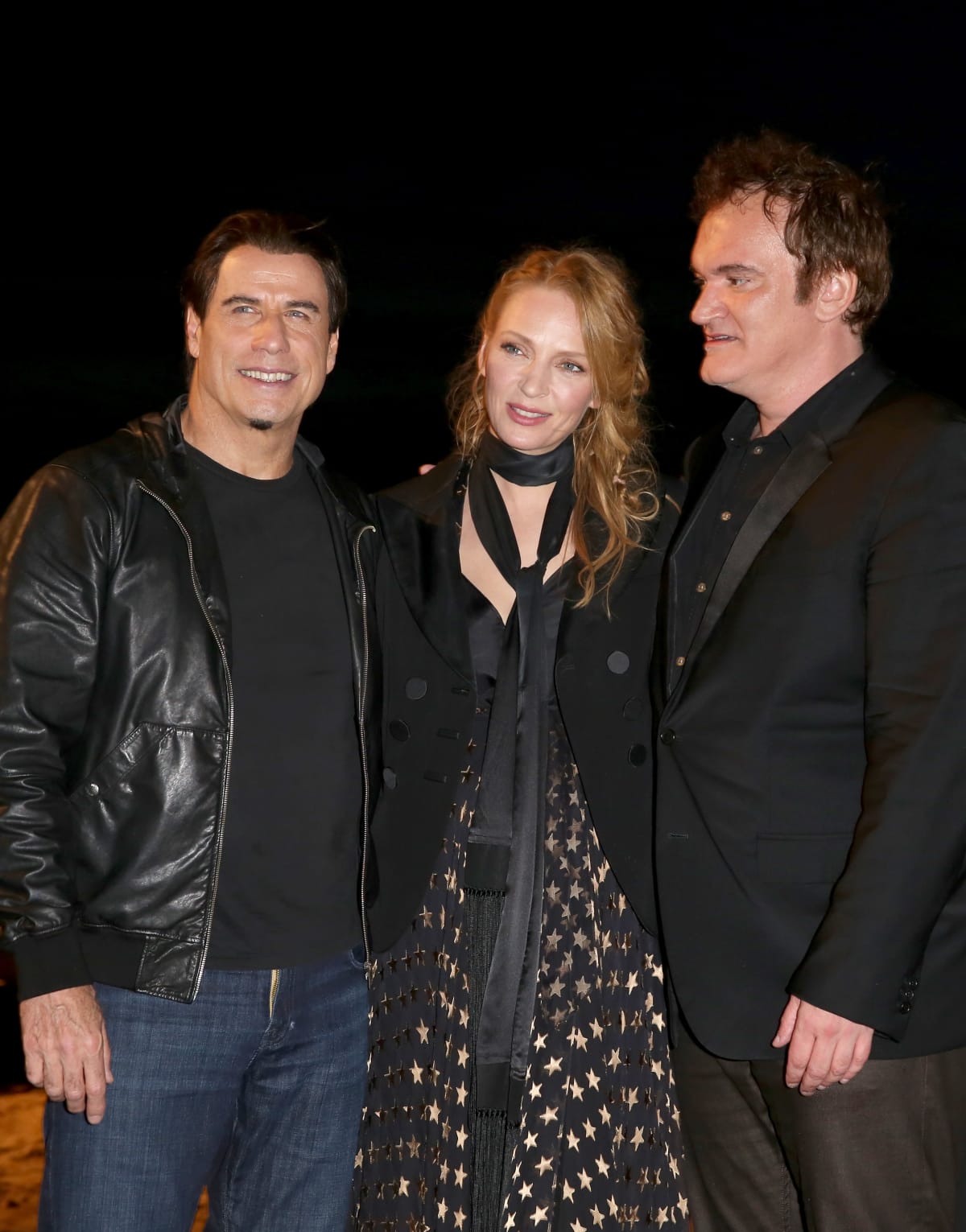 CANNES, FRANCE - MAY 23:  (L-R) John Travolta, Uma Thurman and Quentin Tarantino attend a screening of Pulp Fiction at the 67th Annual Cannes Film Festival on May 23, 2014 in Cannes, France.  (Photo by Tim P. Whitby/Getty Images)