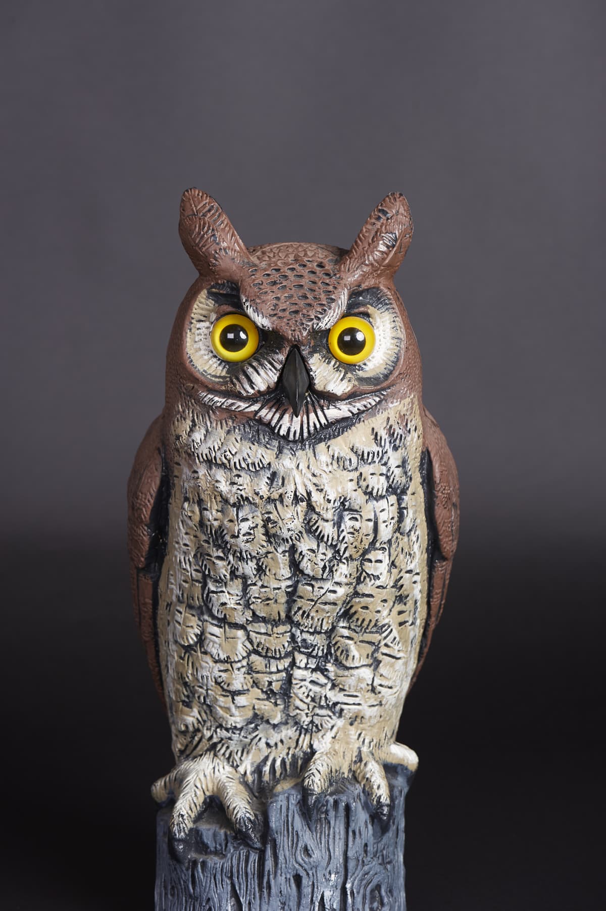Plastic Great Horned Owl decoy used for scaring birds away