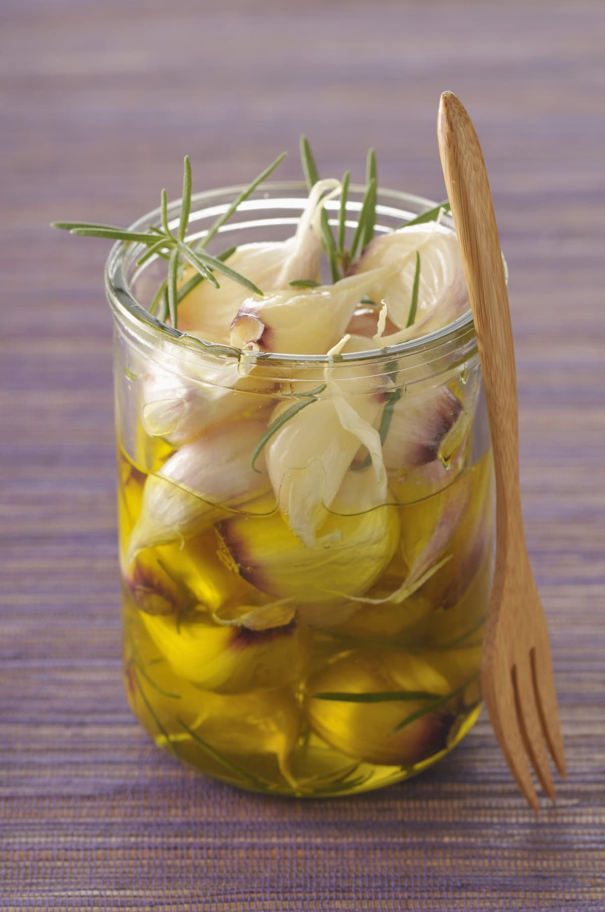 Preserved garlic in olive oil and rosemary