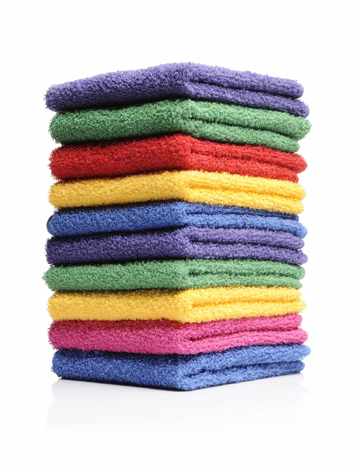 Clean multi-clored towels isolated on white