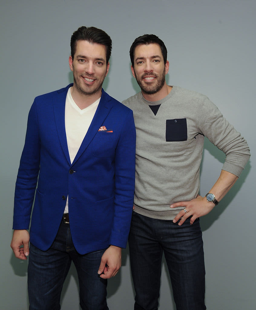 Jonathan Scott and Drew Scott of the "Property Brothers" attend the launch of their new book "Dream Home" at Indigo Manulife Centre on April 15, 2016 in Toronto, Canada.  (Photo by GP Images/WireImage)