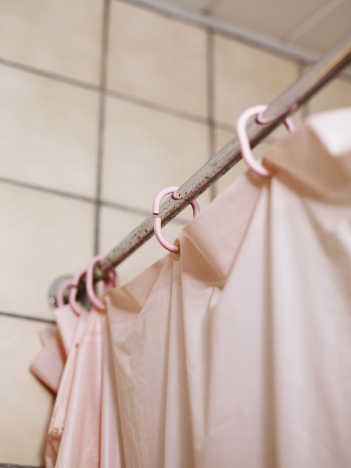 A rusty shower curtain rod