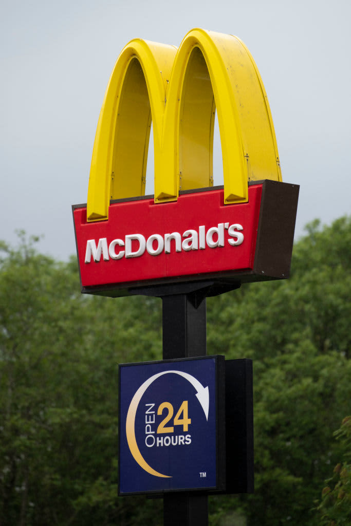 A McDonald's sign outside a drive thru branch.