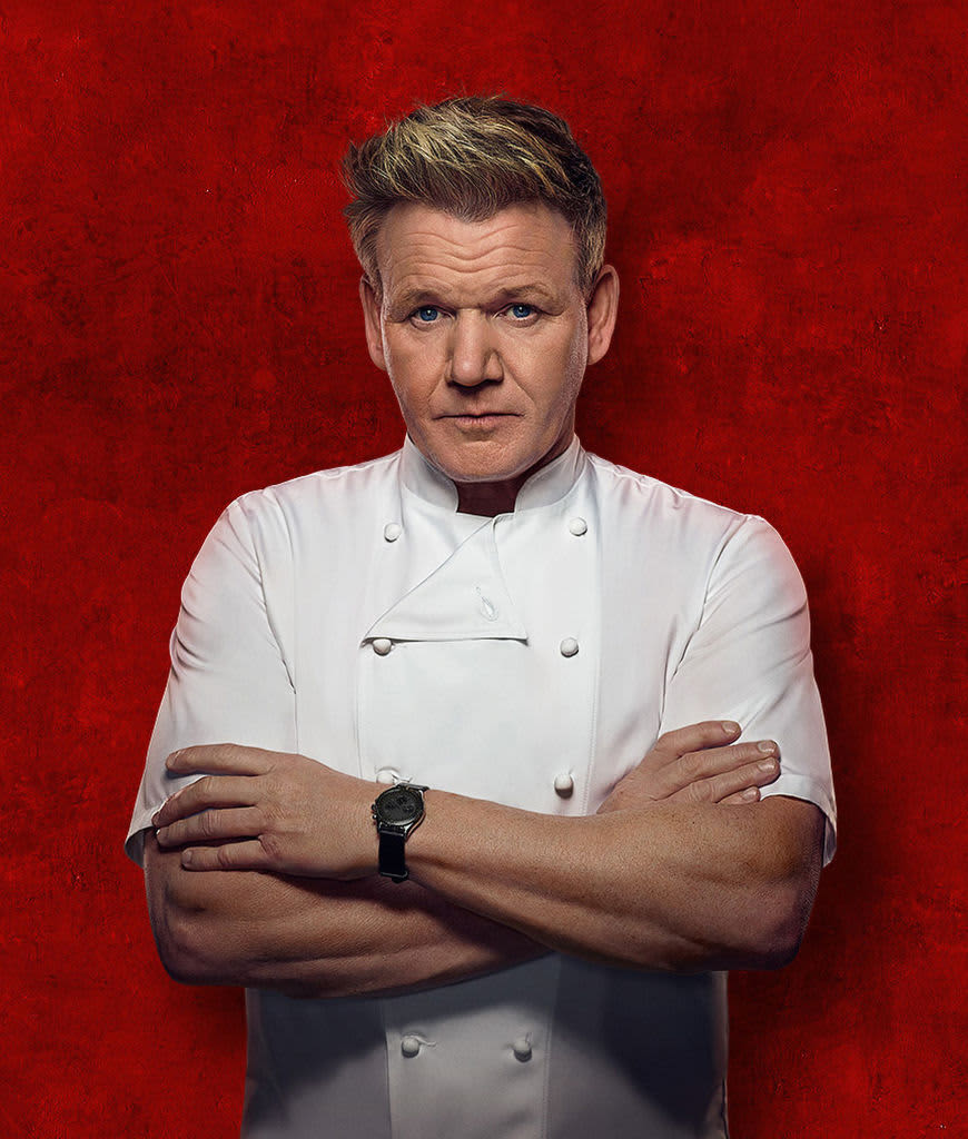 Gordon Ramsay with his arms crossed against a red background.