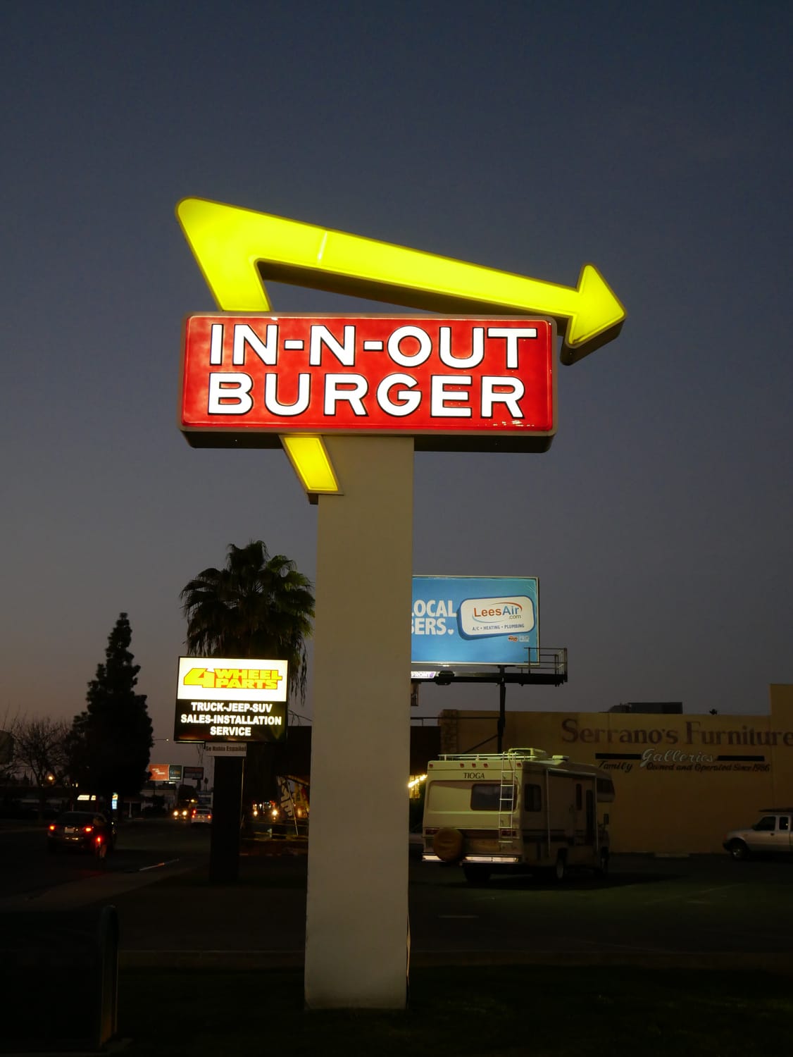 In-N-Out Burger fast food chain sign at night
