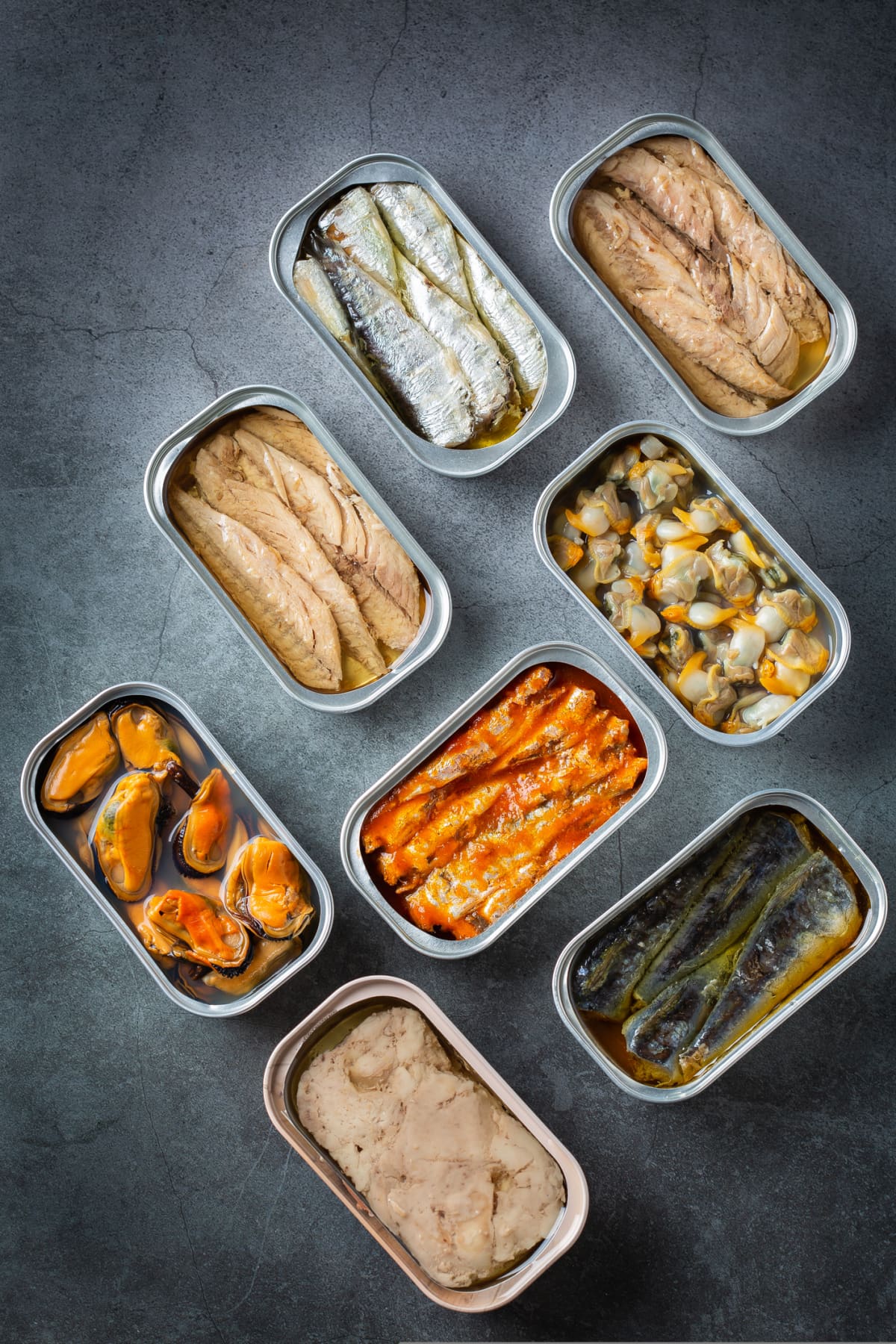 A variety of canned seafood.