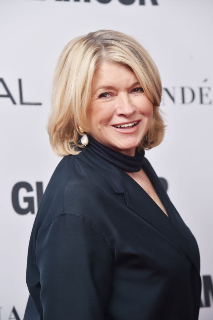 Martha Stewart looking over her shoulder at a red carpet event