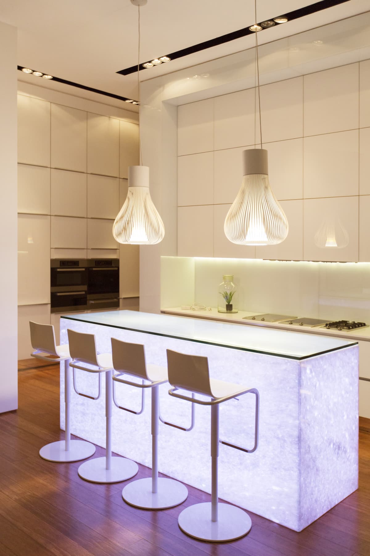 A glowing island in a bright kitchen