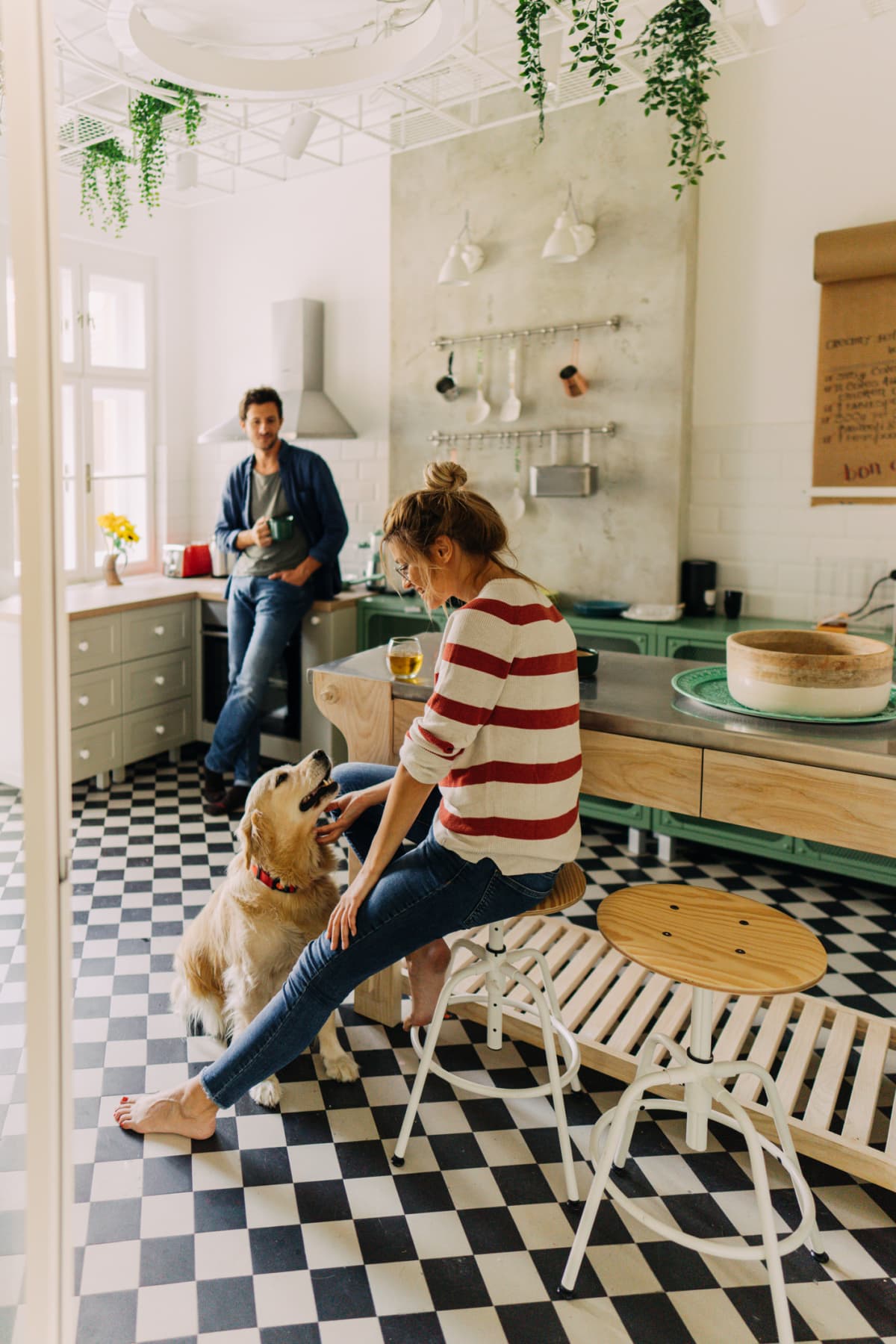 Photo of happy family in a kitchen in the morning. 