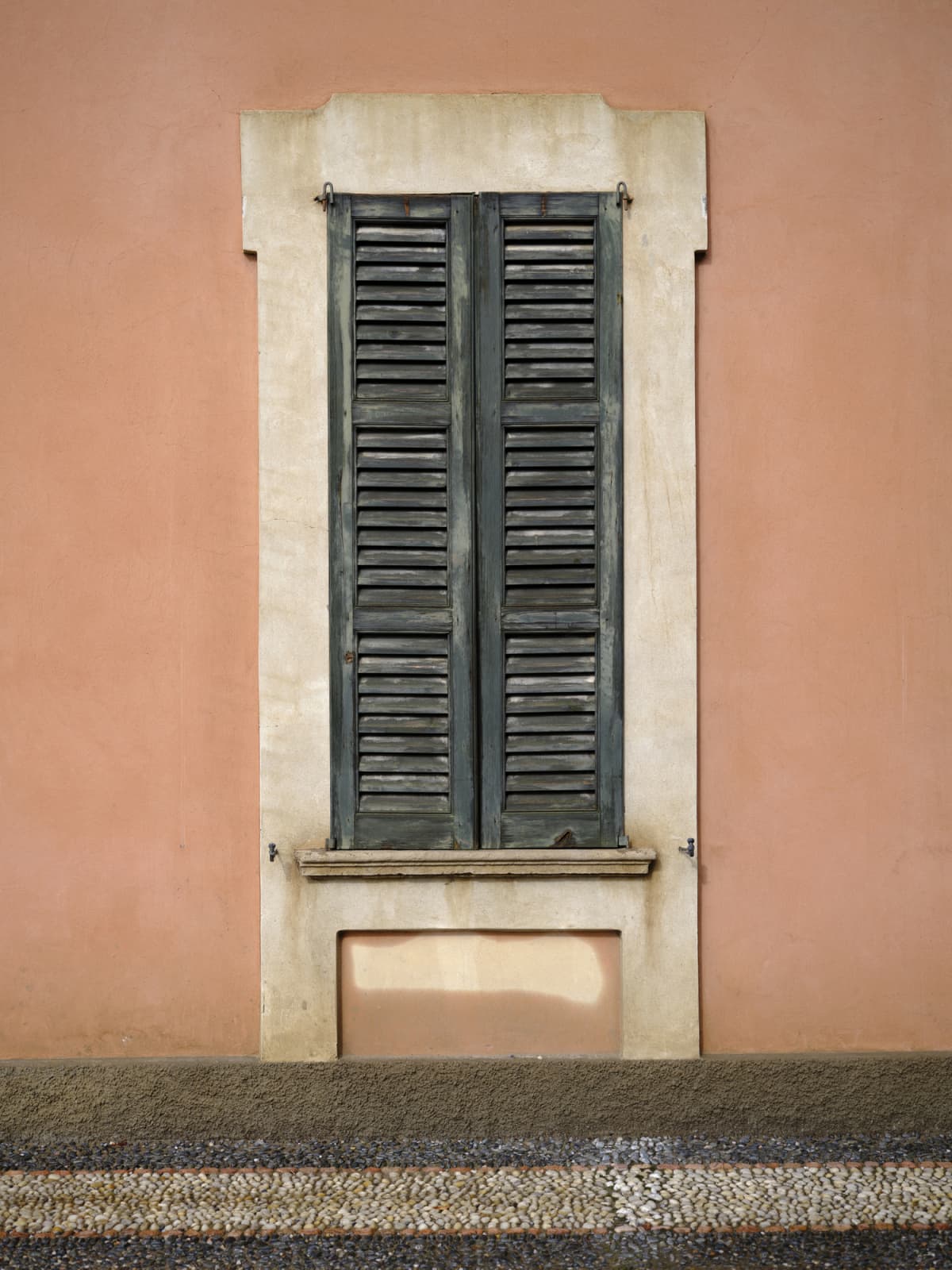 An old window with green shutters